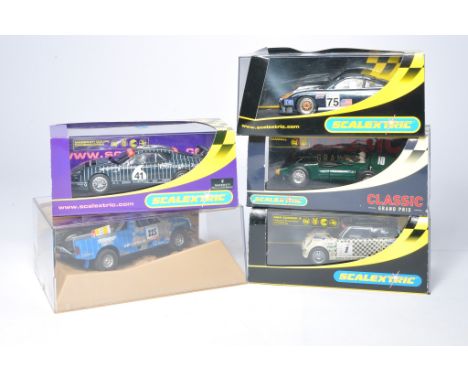 A group of slot car issues, mostly Scalextric. Look to be unused, with original boxes. 