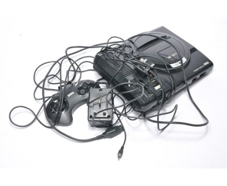 Sega Mega Drive Video Gaming Console plus leads and controller. Untested. 