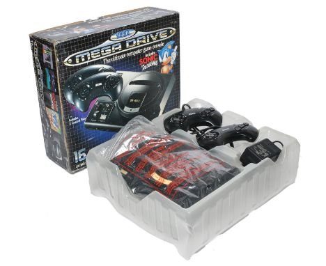 Sega Mega Drive Video Game Console. Looks to be mostly complete in box. Untested. 