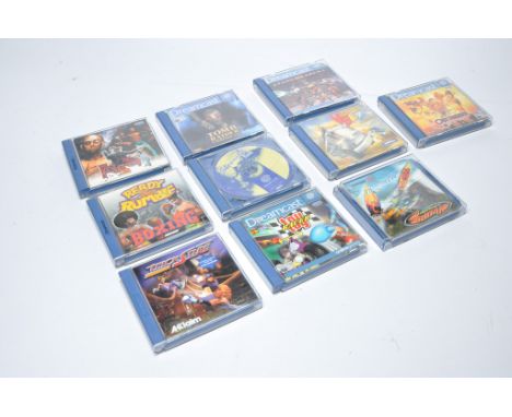 Sega Dreamcast Video games comprising Outtrigger, Quake III Arena, Vigilante 8, Tomb Raider Chronicles, House of the Dead 2, 