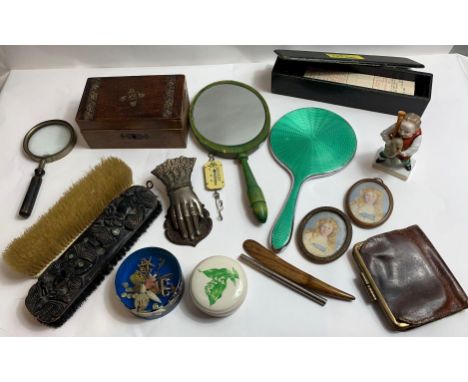A collection of curios and mixed collectables including brushes, portrait miniatures, a large Victorian paperclip in the form