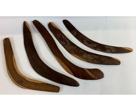 Two boomerangs with kangaroo pattern design, together with three other boomerangs, a didgeridoo, and other items