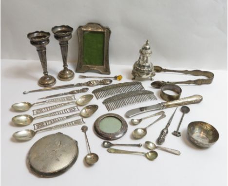 A collection of silver, silver coloured and metalware items; including a Chinese Export hair comb; picture frames; spirit lab