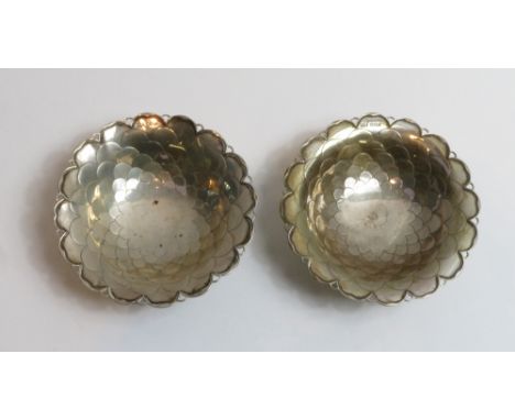 A pair of silver bon bon dishes, by Mappin &amp; Webb, Sheffield 1935, designed as pedestal bowls with scale decoration, 4.5c