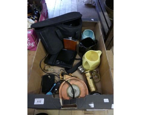 A mixed lot to include various modern pub jugs, aneroid barometer, portable DVD player etc. 
