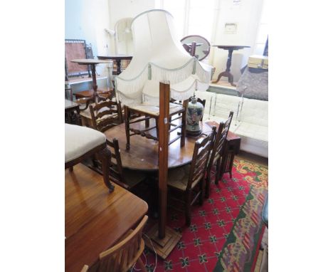 An oak standard lamp with square column and square base, with cream shade (sold electrically untested) 