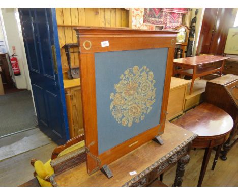 A decorative mahogany framed Hounson Byles firescreen with needlework panel 