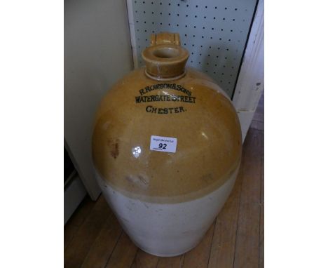 A large stoneware flagon marked 'R. Rowson & Sons, Watergate Street, Chester' 