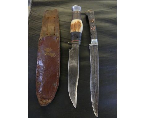 A vintage horn mounted hunting knife with leather sheath, together with a Eastern dagger (2) 