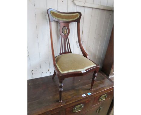 A late 19th Century mahogany framed side chair, the pierced back inset with a small head and shoulders portrait panel of a yo