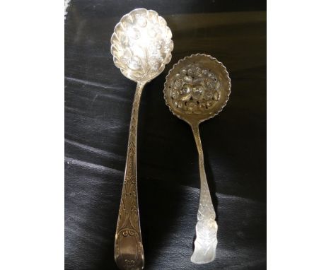 A 19th Century silver sauce ladle with bright cut decoration and later floral embellished bowl, together with a similarly dec