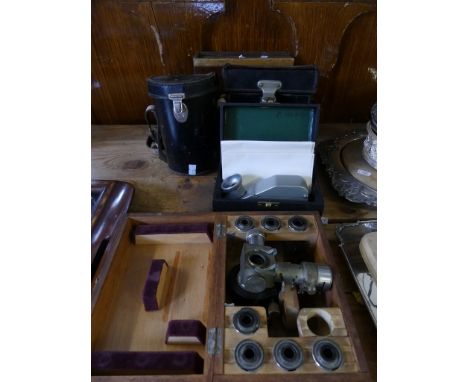 A mixed lot comprising a surveyors sight square, in leather case, a Cowley automatic level by Watts, in fitted leather case, 
