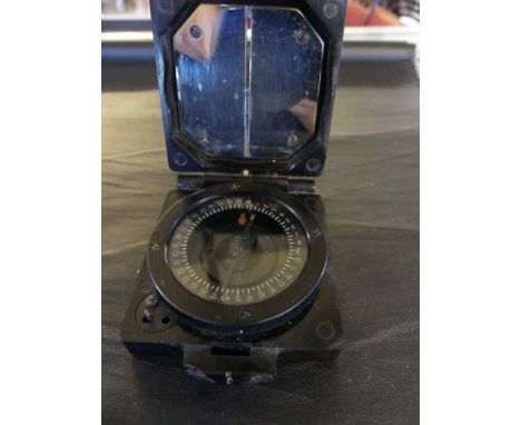 A World War II magnetic marching compass Mk1,  bearing military arrow 