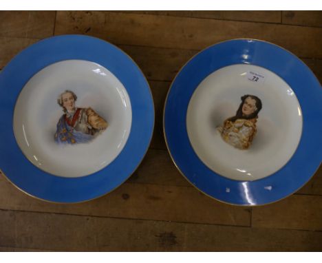 A pair of 19th Century French ceramic wall chargers, each hand painted with busts of Louis XV & Marie Leszczynska, diameter 3
