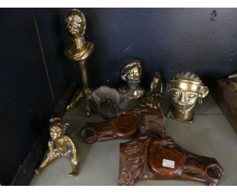 A mixed lot comprising a novelty brass table lighter, formed as a negro's head together with further brass ornaments and bron