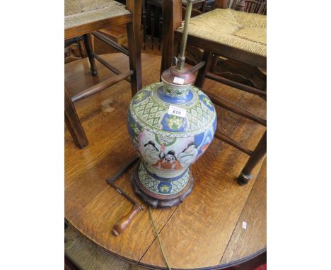 An Oriental table lamp on hardwood base (sold electrically untested) 