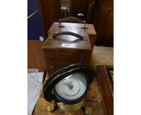 A mixed lot comprising a vintage electric shock machine, in fitted wooden case, a vintage Servis time recorder with cards, in
