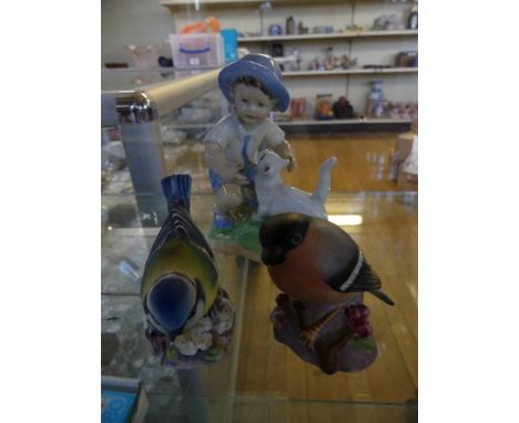 A Royal Worcester figurine 'September' together with two Royal Worcester model birds (3) 