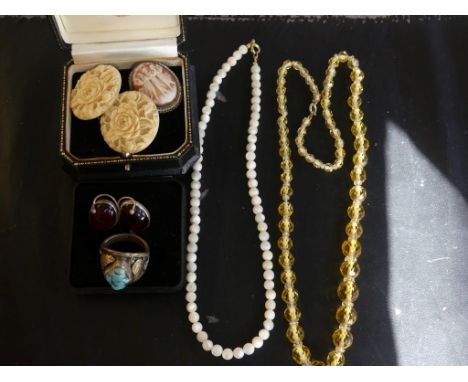 A citrine and rock crystal style facted bead necklace, together with, a cameo brooch, amber ear studs, a mother of pearl bead