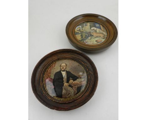Two framed ceramic plaques, one printed with two dogs and a farmer to one, the other with a portrait of a gentleman.