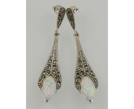 A pair of silver, marcasite, opal drop earrings. 