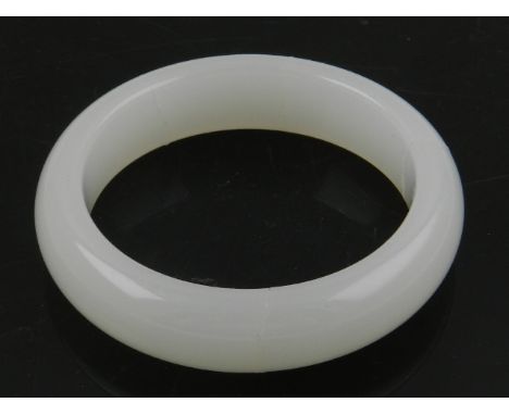 A Chinese white hardstone bangle 