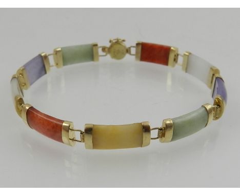 A 14 carat yellow gold and multi-coloured jade segmented bracelet.
