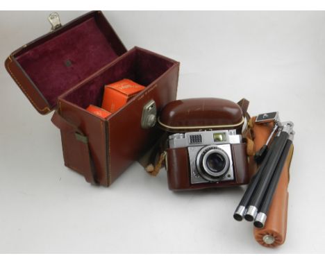 A Zeiss Icon contina camera with flash tripod and associated equipment