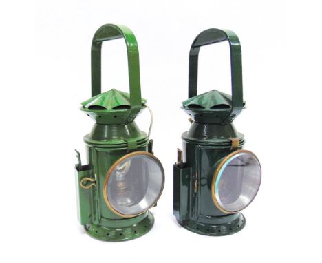 TWO SERVICE ISSUE HAND LAMPS both repainted green, each complete with clear, blue and red filters, reservoir, burner and refl