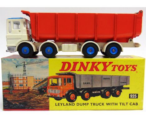 A DINKY NO.925, LEYLAND TIPPER TRUCK white and orange with a blue cab roof and blue plastic hubs, mint, boxed, the box genera