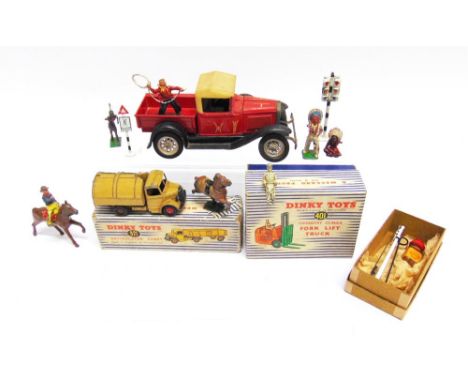 A DINKY NO.401, COVENTRY CLIMAX FORK LIFT TRUCK orange with mid green forks and ridged hubs, and with an unusual gilt metal w