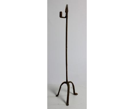 A rare large antique Irish wrought iron Rush Light, with pillar support on tripod base, 94cms (37") high. (1)