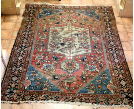 A 19th Century square Oriental red ground Carpet, together with two small cream and blue ground Runners. (3)