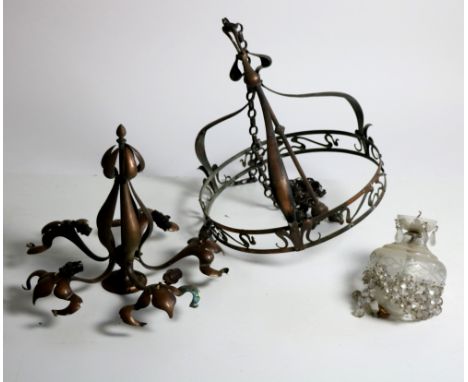 A large Art Deco hand beaten copper Ceiling Light, two smaller ditto, a heavy decorated copper Table Lamp, and two cut glass 