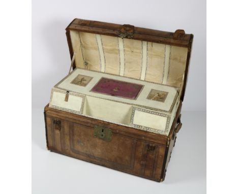 A fine rare large tooled and embossed American leather humpback Travel Trunk, fitted with compartmented tray, 'Warranted Sole