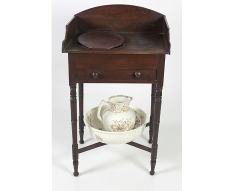 A 19th Century mahogany Washstand, with gallery back over frieze drawer on turned legs united by X framed stretcher, together