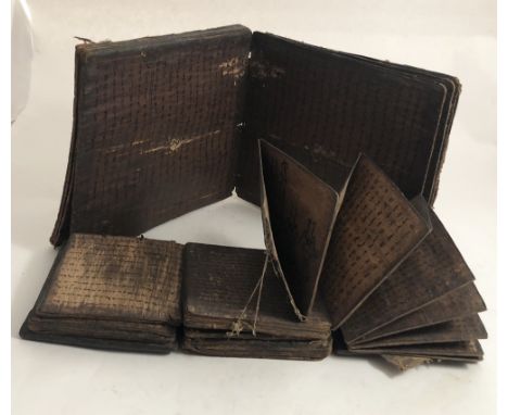 A large 17th Century Coptic Manuscript, consisting of 20, 4to leaves (40pp) in concertina form, and a smaller similar item, w