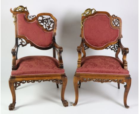 An almost matching pair of 19th Century French carved "Throne" Chairs, in the manner of Gabriel Verdoit, decorated in the Chi