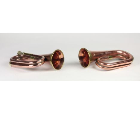 A pair of copper and brass Bugle Horns, by Hawkes &amp; Son, London, with embroidered tassels. (2)