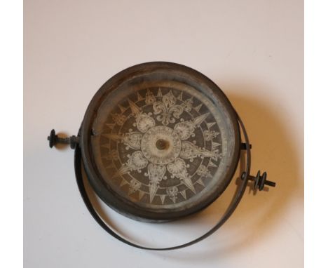 A 19th Century Ship's Compass, with decorative engraved dial. (1)