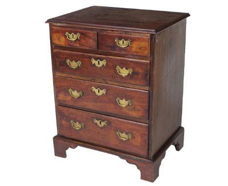 A Georgian period Irish mahogany Bachelors Chest, of unusually small proportions, the moulded top over two short and three lo