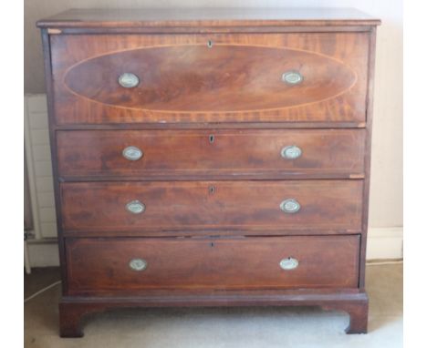 A 19th Century inlaid mahogany Chest of drawers, the crossbanded top over a large top drawer with oval inlaid decoration and 