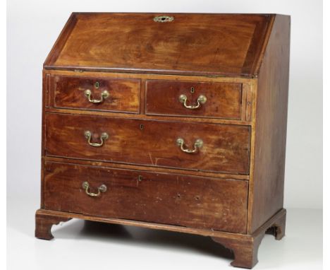 A Georgian period mahogany drop front Bureau, with fitted interior, over a base on bracket feet, approx. 102cms (40") wide x 