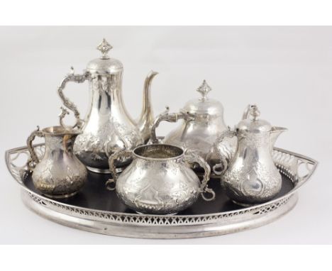 A fine extensive English Victorian silver Presentation Tea Service, teapot, coffee pot, hot water jug, and sugar and cream ju