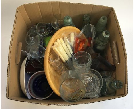 A mixed lot to include a number of vintage glass bottles, glassware, flatware, several nutcrackers, turned wooden bowl, etc 