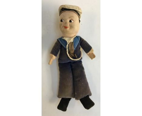 A vintage Norah Welling cloth sailor doll, hat reading 'R.M.S Saxonia', 22cmH 