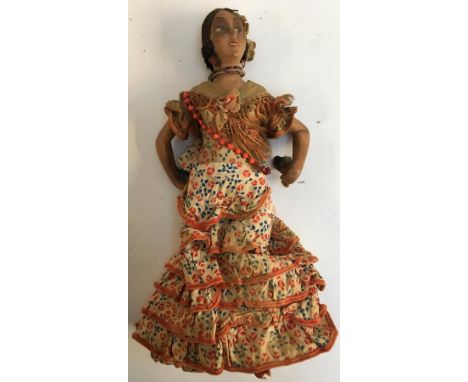 A vintage Spanish flamenco doll, composition body with hand painted detail and stencilled fishnet tights,  37cmH 