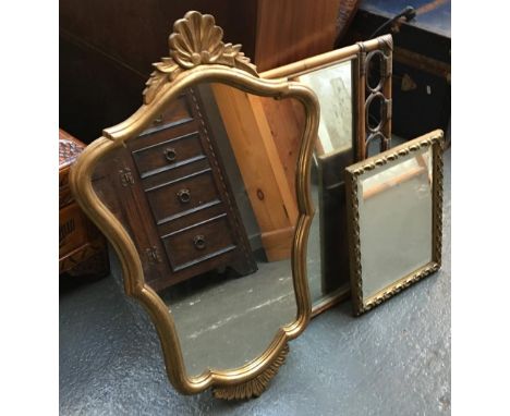 A bamboo frame wall mirror; a gilt framed wall mirror with shaped plate and shell cresting and one other gilt framed mirror, 