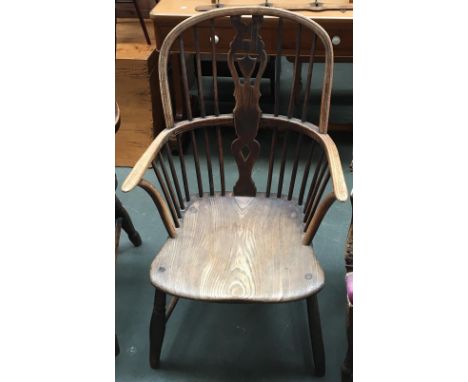 A windsor chair with bent wood arm supports, on turned legs and stretcher; together with an oak joint stool (2) 