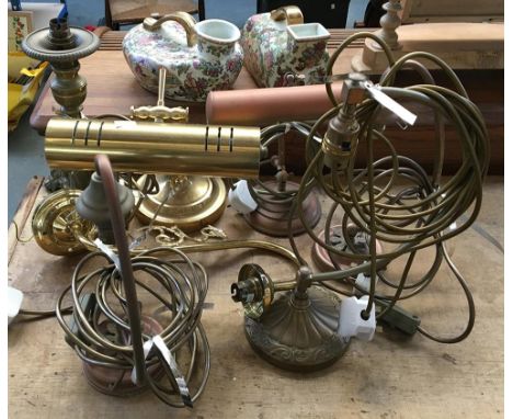 A number of brass and gilt metal light fittings, to include two library style desk lamps 
